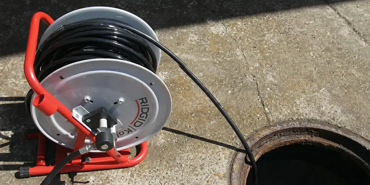 sewer rodding equipment prepared to clear clogged sewer lines in Spokane, WA
